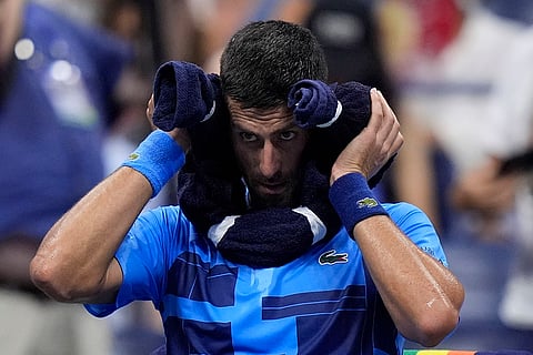 US Open 2024: Novak Djokovic, of Serbia, puts a towel around his neck during a second round match against Laslo Djere